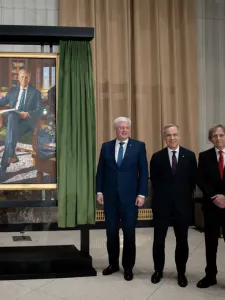 A large portrait painting on the left, and three men standing beside it: Stephen Harper, Mark Carney and Phil Richards. 