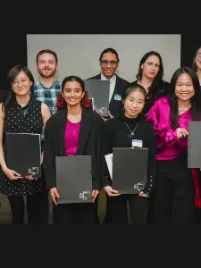 Students holding their awards