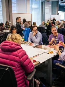 Photo of people sitting at a table