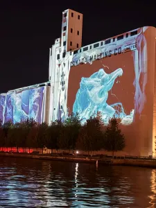 Image of Canada Malting Silos with projection of artwork.