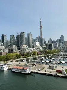 Photo of Toronto's Marina Quay West pier with CN Tower and city in the background