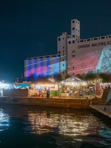 SILO NIGHTS at night as part of Public Pier, waterfront, Canada Malting Silos in background