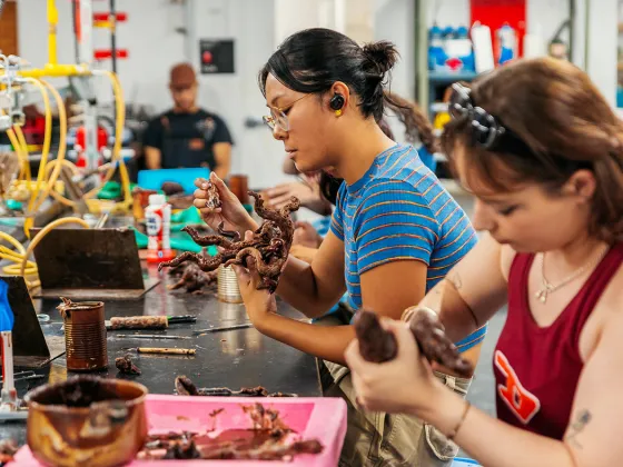 Students working on clay