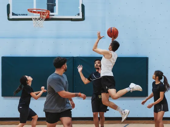 Students playing basketball