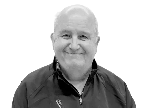 Bald man smiling wearing shirt with zipper