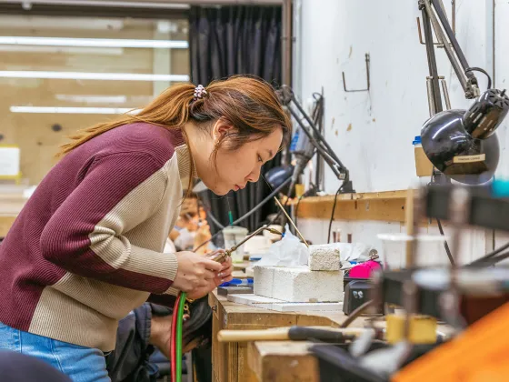 Student working at a jewellery bench