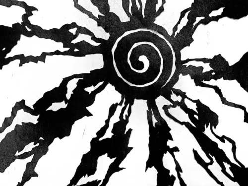 black and white swirl pattern with radiation