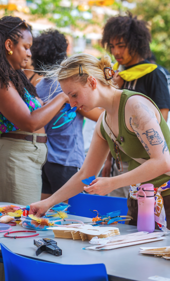 Person working at a table at orientation