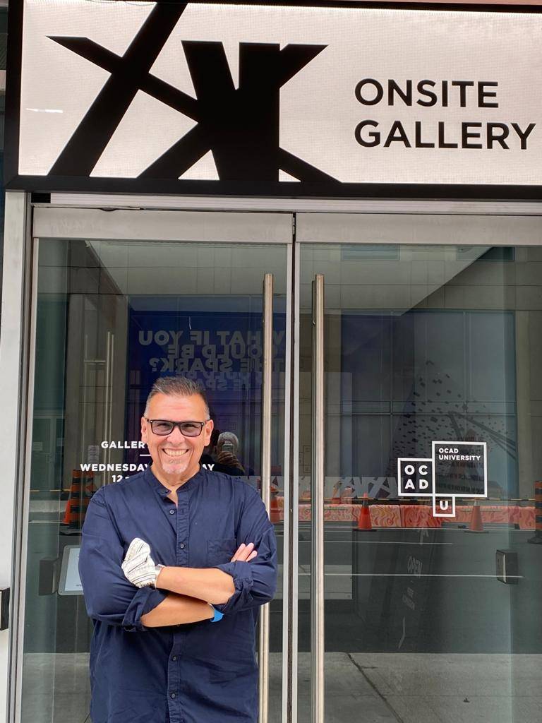Photo of man in front of Onsite Gallery