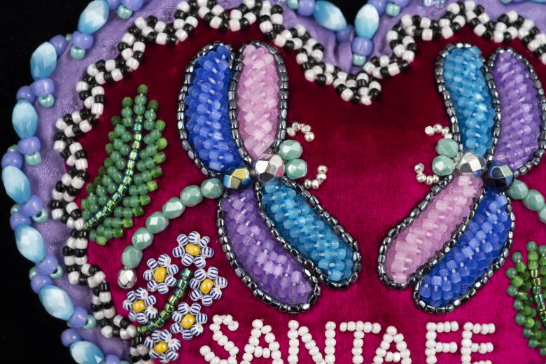 Close up of a colorful beaded work by Grant Jonathan 