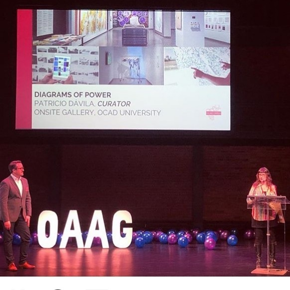 Lisa Deanne Smith accepts OAAG award on behalf of Onsite Gallery and Patricio Dávila 