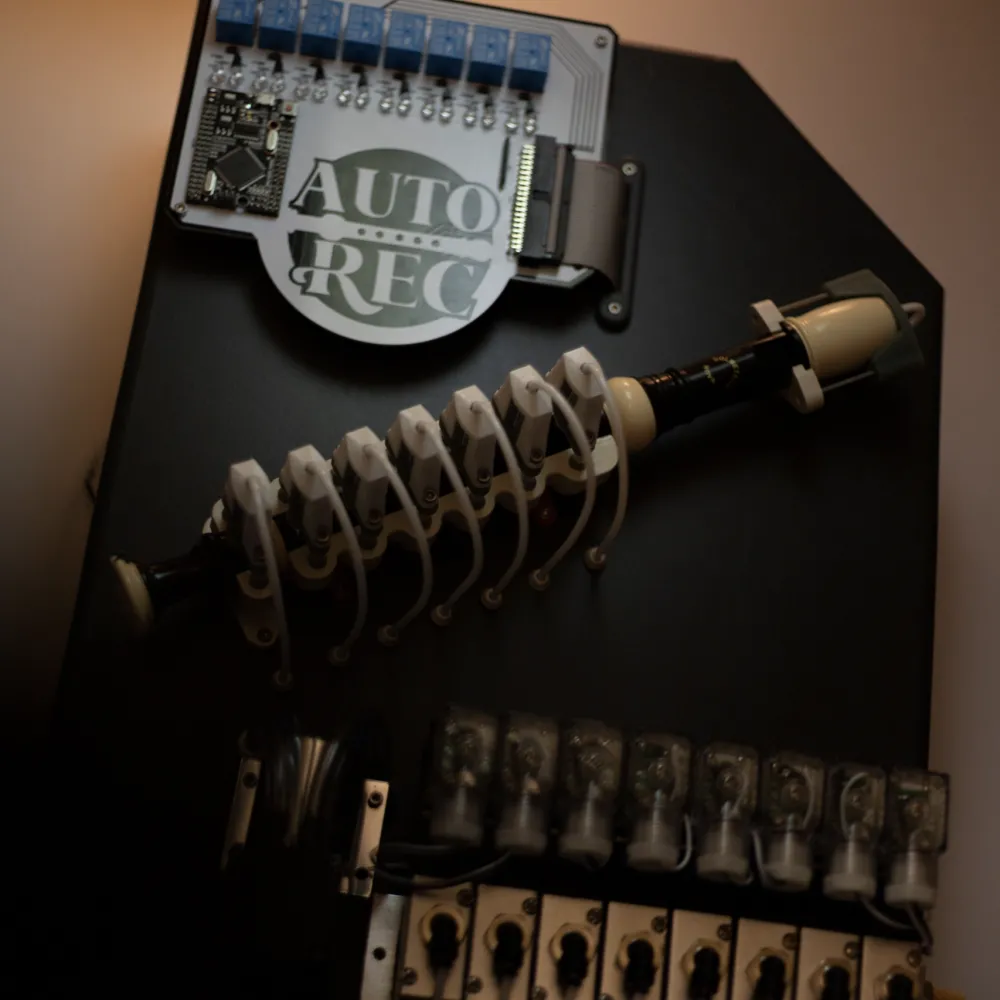 Close up of a digital apparatus that plays a plastic recorder