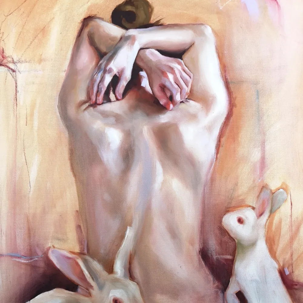 Painting of a woman's back with rabbit