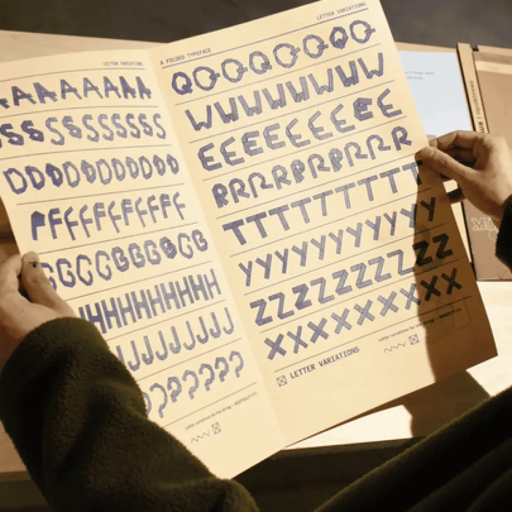 Open broadsheet type specimen