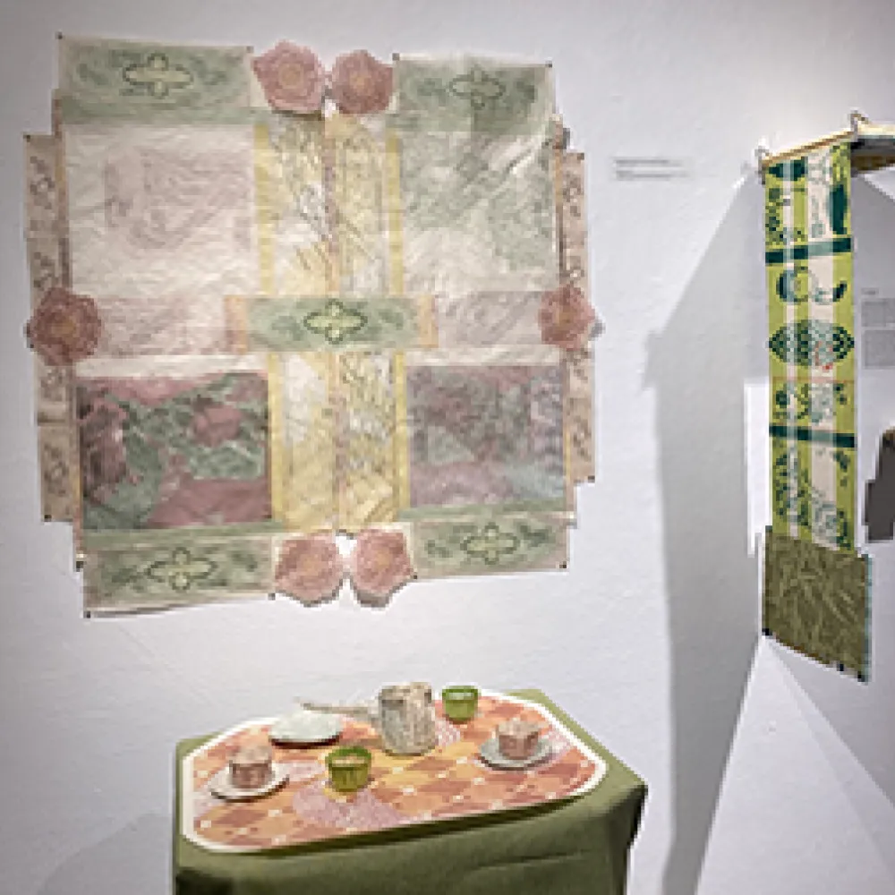 Print making installation on a gallery wall