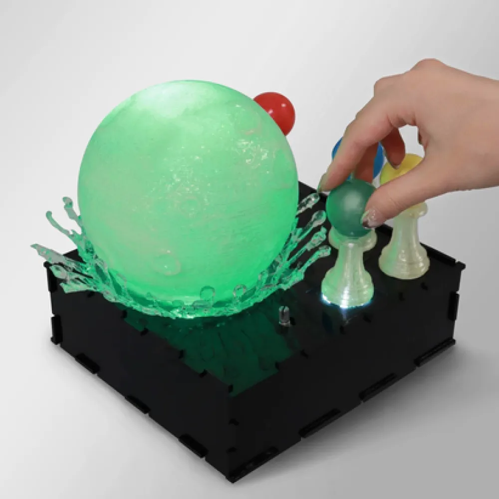 Sculpture of a sphere and chess pieces